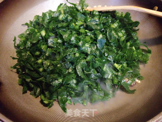 腊肉炒萝卜缨步骤8