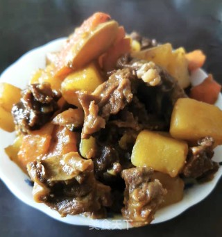 土豆胡萝卜焖牛肉步骤10