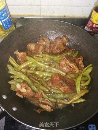 脆骨焖豆角步骤9