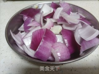 洋葱木耳炒蒜苔步骤3