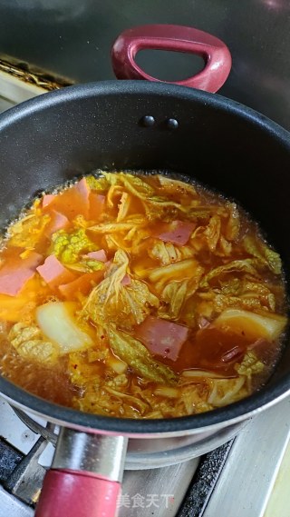 芝士泡菜煮年糕步骤9 芝士泡菜煮年糕步骤9