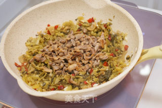 酸菜炒鸡胗步骤9