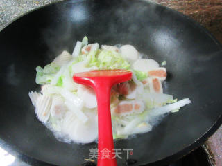 包心鱼卷大白菜炒年糕步骤4