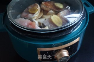 萝卜炖鱼步骤8