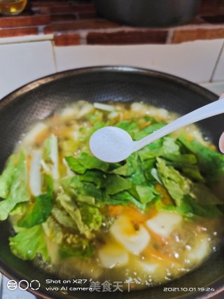 酸菜煮年糕步骤5