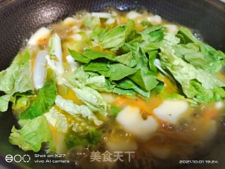 酸菜煮年糕步骤4