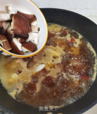 香菇豆腐炖鸡块步骤7