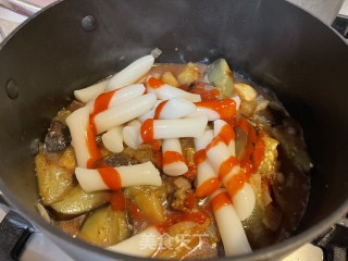 豆酱茄子年糕煲步骤7
