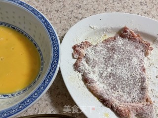 滑蛋洋葱汁烩猪扒步骤9