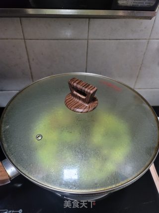 酸菜烧毛豆步骤7
