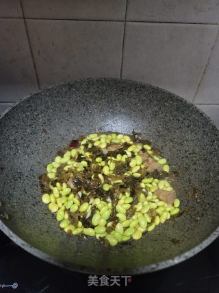 酸菜烧毛豆步骤8