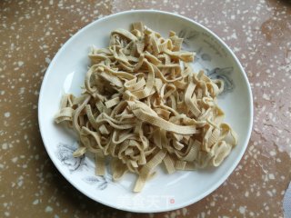 豇豆炒千张步骤1