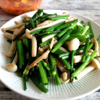 韭菜苔炒海鲜菇步骤16