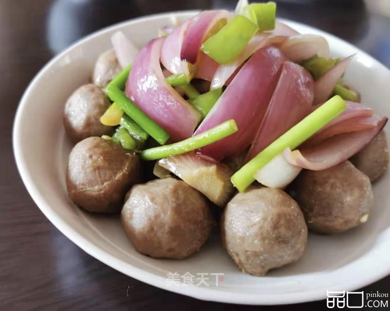 洋葱蒜苔炒牛筋丸