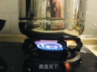 鲫鱼焖黄豆步骤7