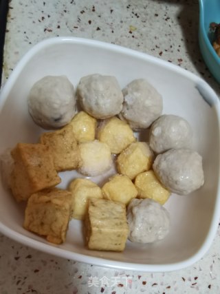 酸辣土豆烩丸子步骤5