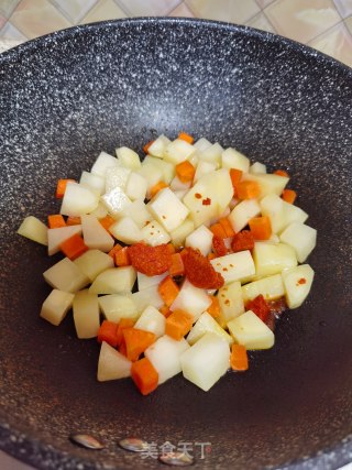 酸辣土豆烩丸子步骤8