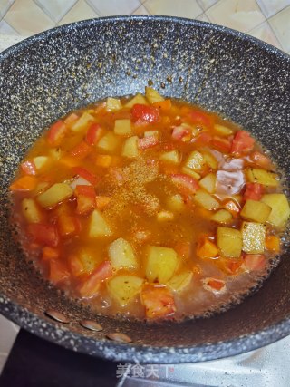 酸辣土豆烩丸子步骤12