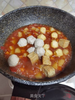 酸辣土豆烩丸子步骤15