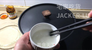 懒人版麻婆豆腐、又香又麻又辣，就着汤汁能吃两碗米饭。步骤8