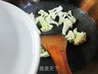 香干茭白炒花菜步骤4