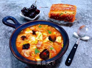 辣白菜金针菇猪头肉豆腐汤步骤12