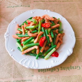 鸡肉炒蒜苔步骤11