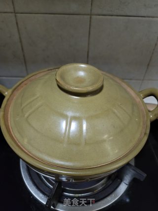 五花肉春笋酸菜煲步骤9