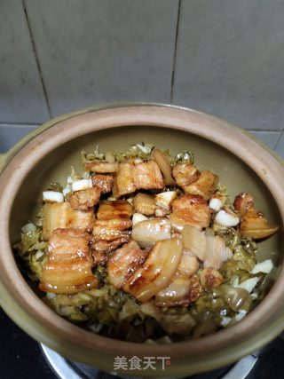 五花肉春笋酸菜煲步骤8
