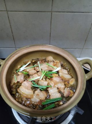 五花肉春笋酸菜煲步骤11