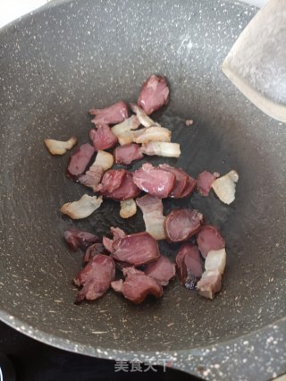 腊肉腊猪舌炒蒜苔步骤13