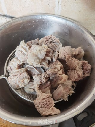 焖牛腩步骤7