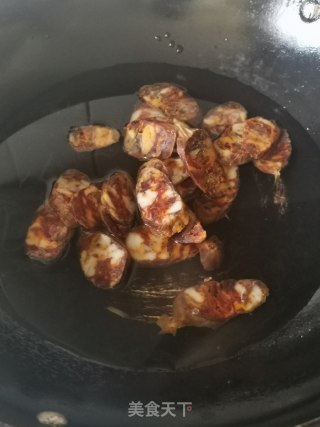 蕨菜干炒麻辣肠步骤8